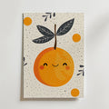 The no-9 features a playful illustration of an orange with a cute smiling face, surrounded by smaller oranges and leafy branches on a speckled white background.