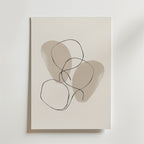 Linear Harmony Poster by Bozetto har minimalistisk abstrakt konst med två mjuka beige former och tre överlappande svarta linjeslingor, tryckt på premiumpapper för en lyxig matt finish.