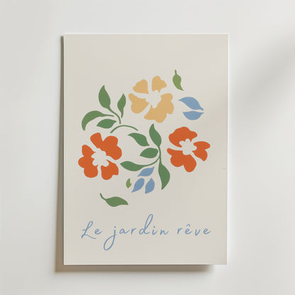 Bozetto Le Jardin Reve Flower Poster på premiumpapper visar stiliserade orange, gula och blå blommor med gröna blad och "Le jardin rêve" i ljusblå kursiv stil. FSC-certifierad för hållbarhet.