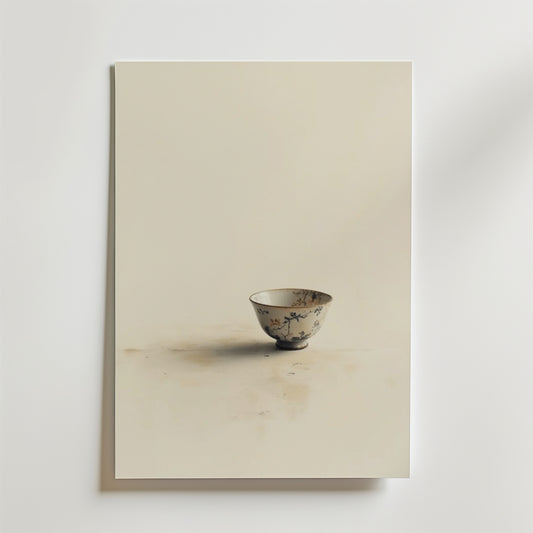 Ett fotografi av en enda utsmyckad porslinsskål med blommönster, placerad på en ljus yta, förkroppsligar minimal elegans - perfekt för hållbar inredning eller som Bozetto Vintage Ceramic Cup Poster på premiumpapper.