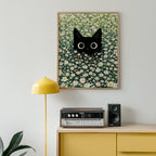 Cat in Green Grass poster i ram i modernt rum