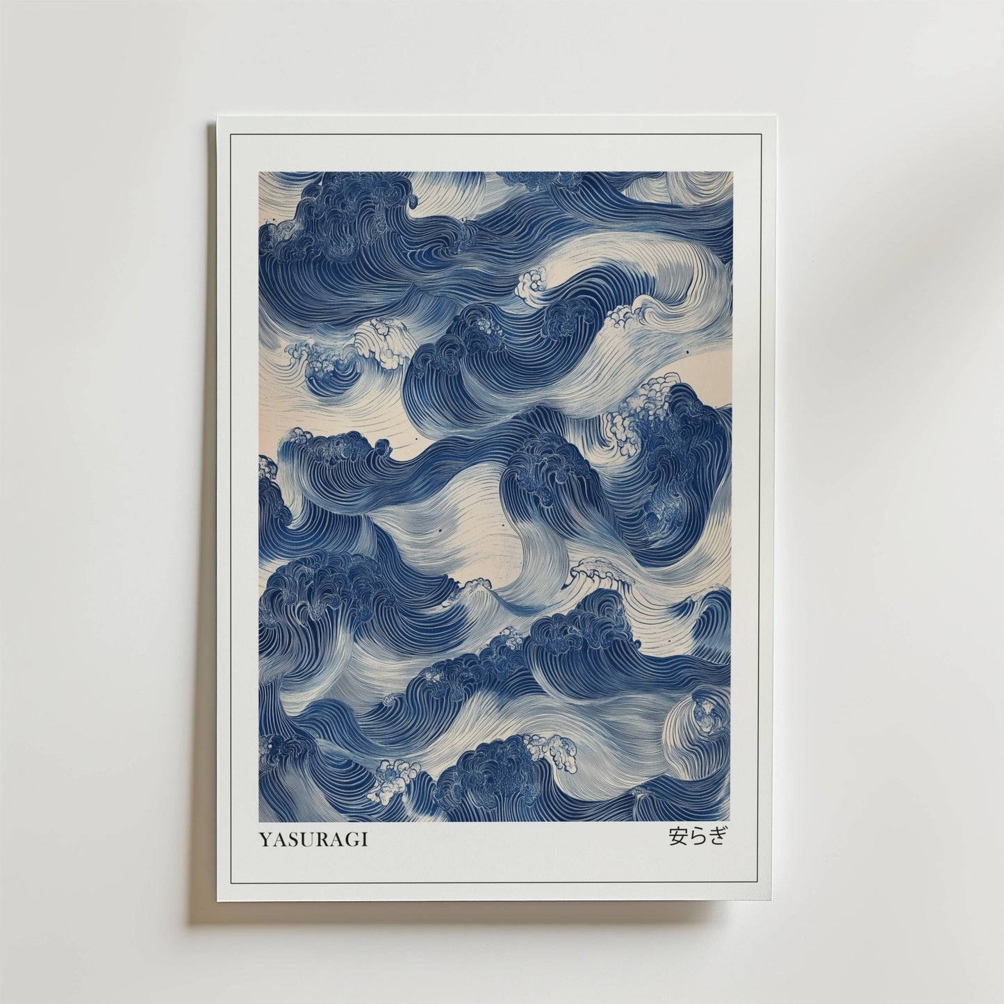 Bozetto Yasuragi Poster föreställer stiliserade blå vågor i en traditionell japansk ukiyo-e design, med "YASURAGI" och japanska tecken längst ner, vilket ger en känsla av visuell meditation på vilken vit vägg som helst.