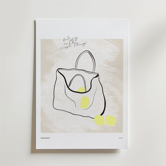 Everyday Ritual Poster by Bozetto visar en minimalistisk linjeteckning av en öppen tygväska med gula ovaler och handskriven text: "find joy in the simple things-celebrating vardagens ritualer och hemmets estetik.